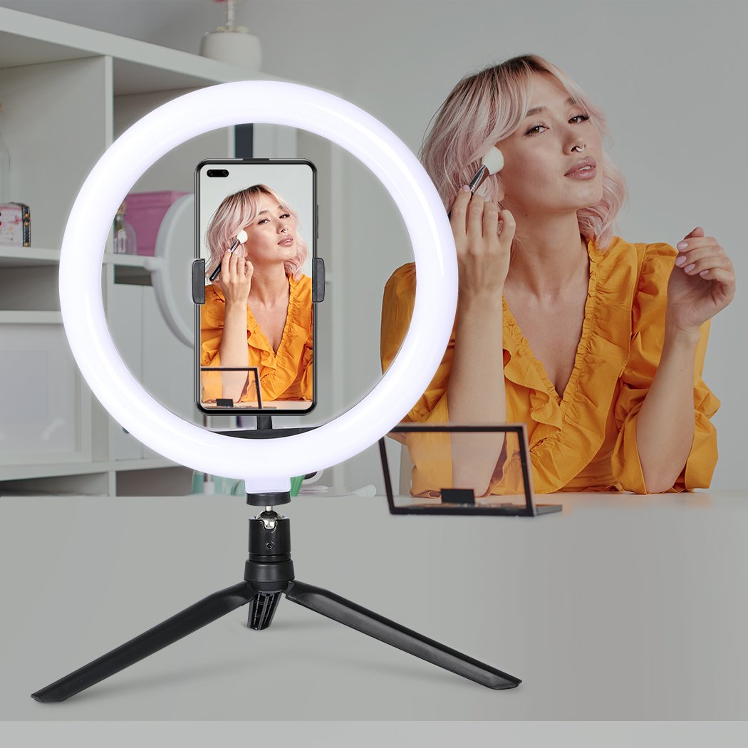 LED Ring Light with Tripod Stand and Phone Holder, showcasing adjustable brightness and color temperature for photography and video.